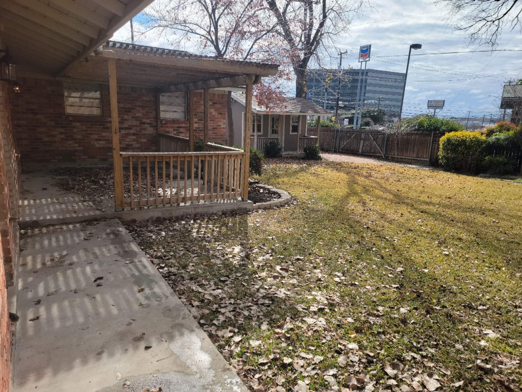 lawn and patio full of leaves